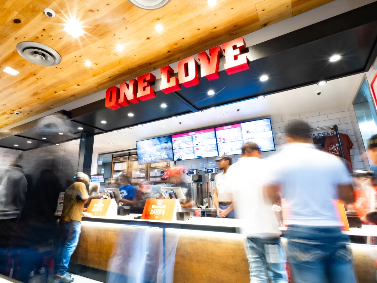 the front of a Raising Cane's restaurant