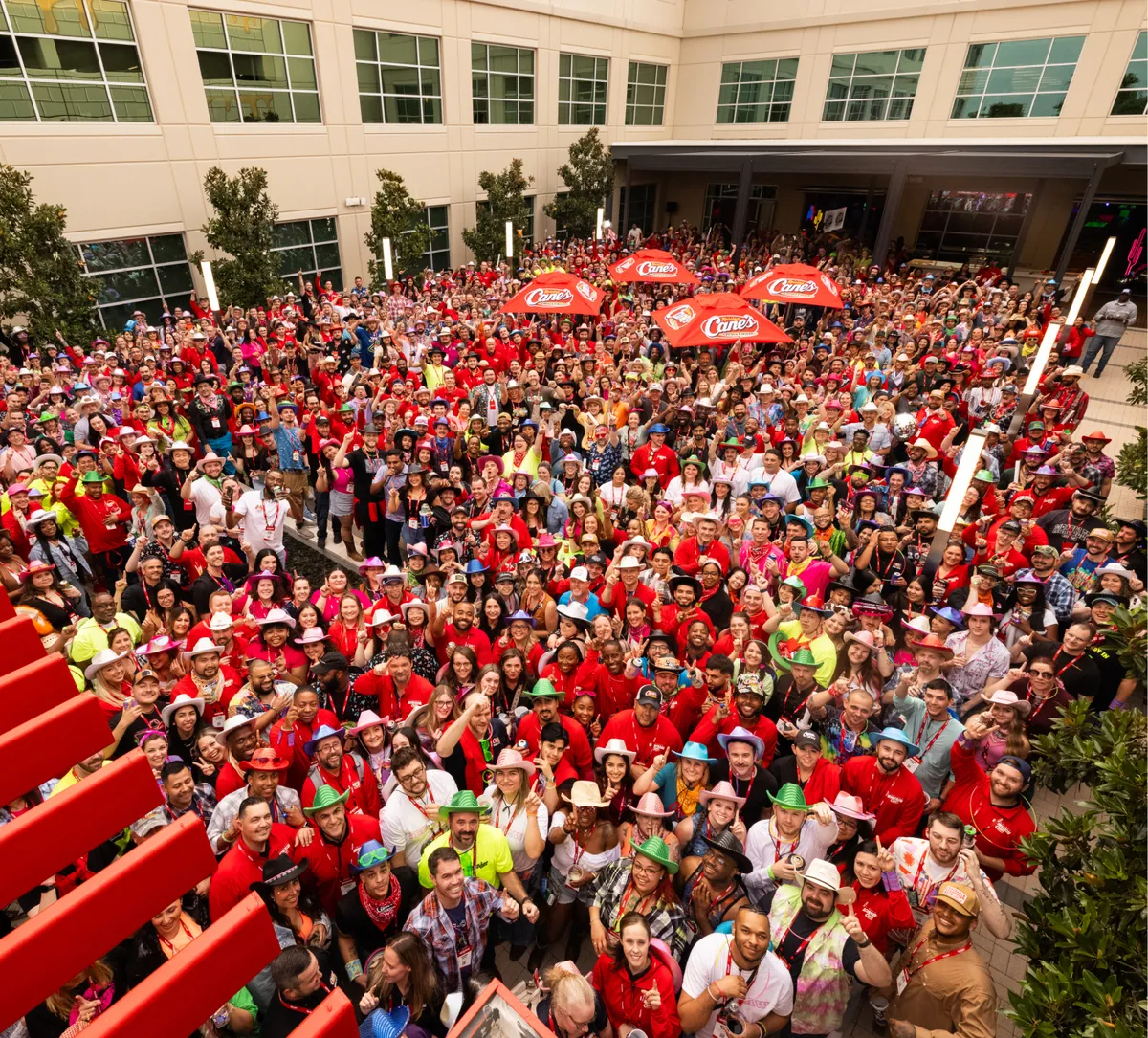 a group of employees standing in a yard