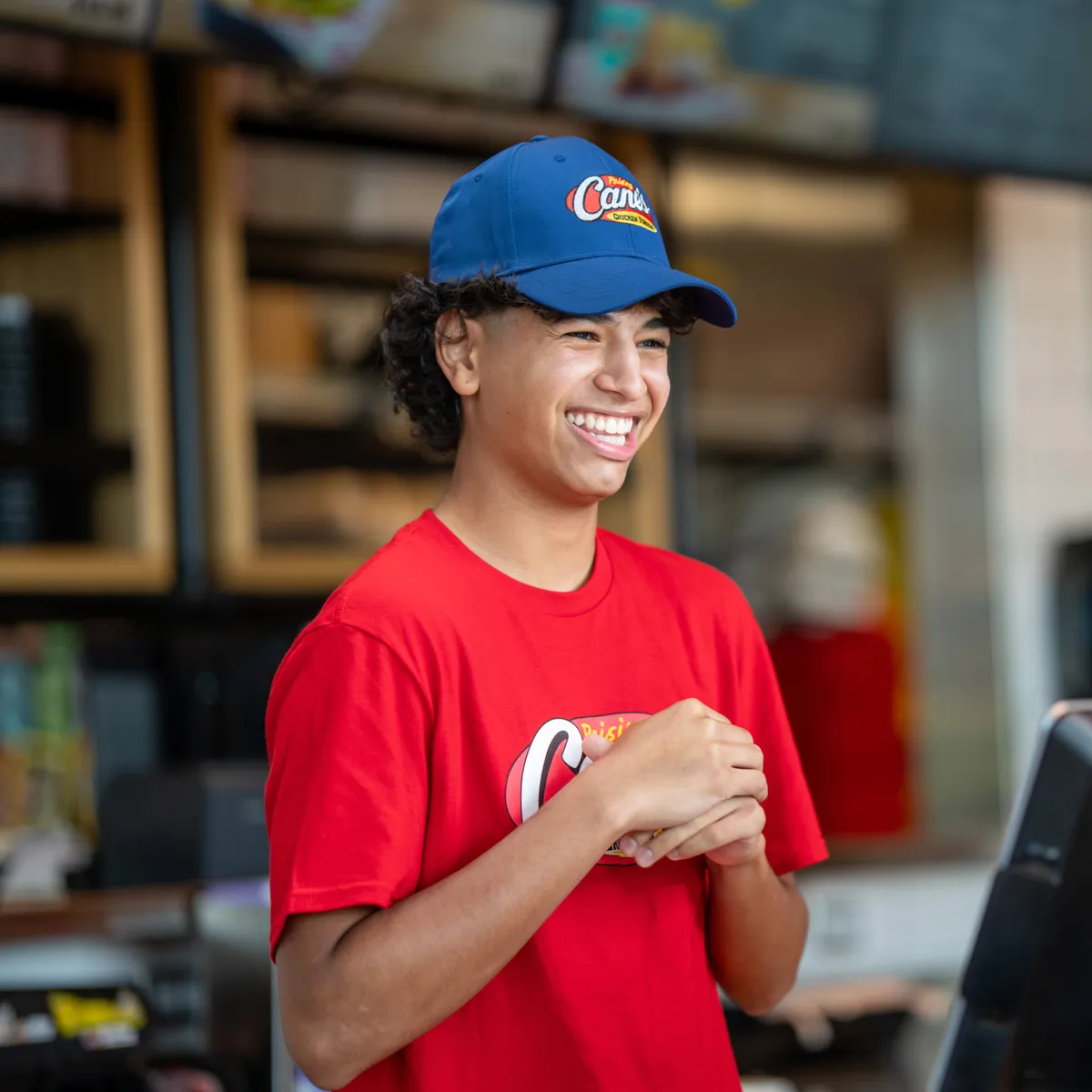 a male employee smiling