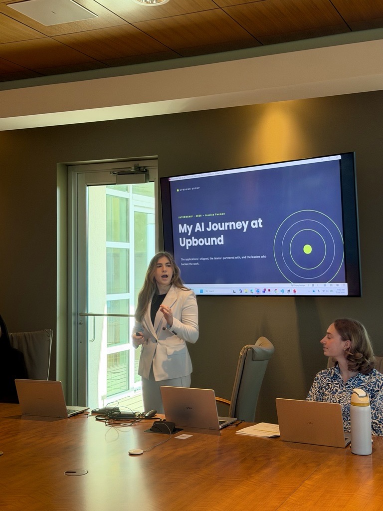 An Upbound intern presenting her AI project to the team