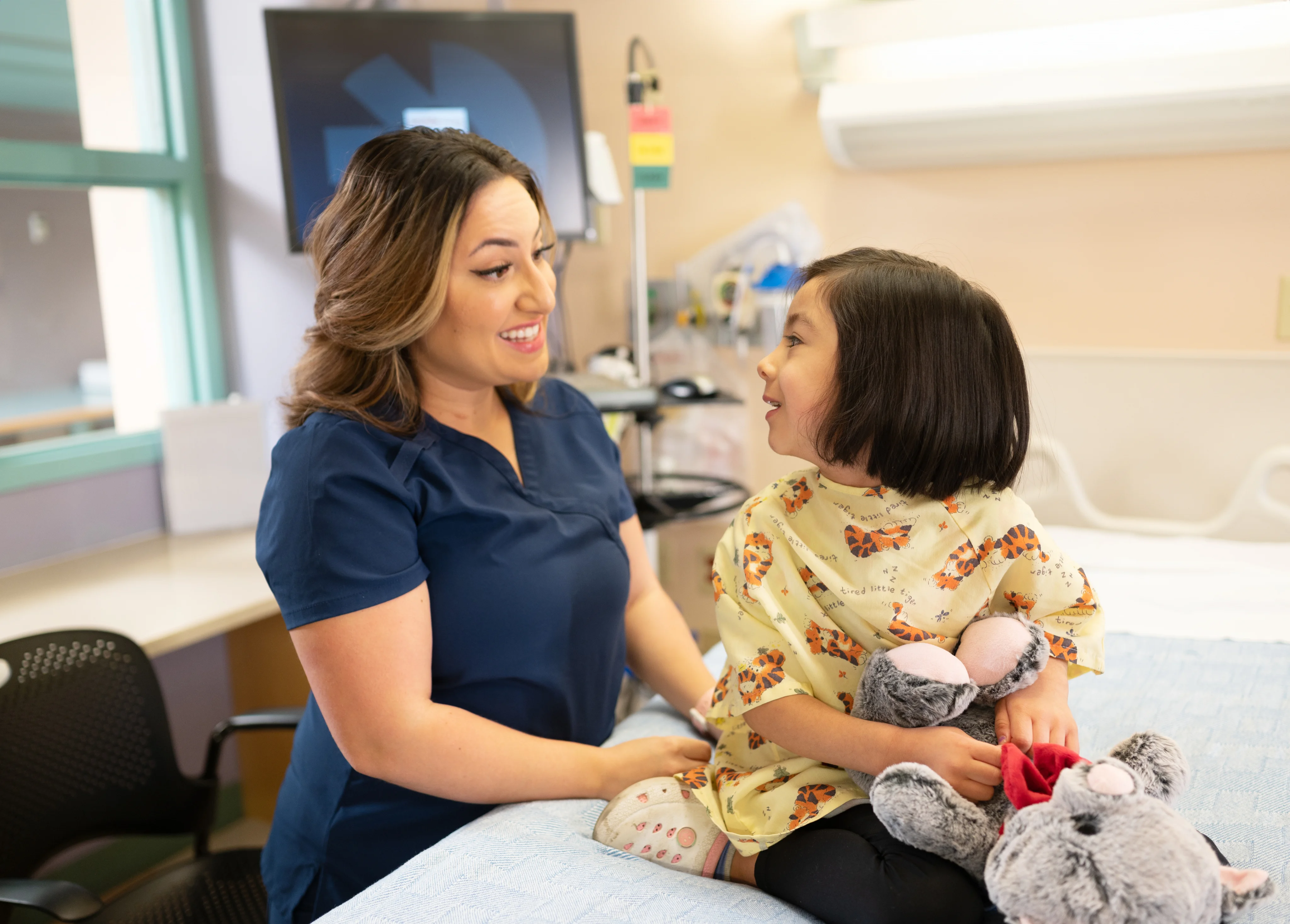 Healthcare professional caring for young patient at Onvida Health