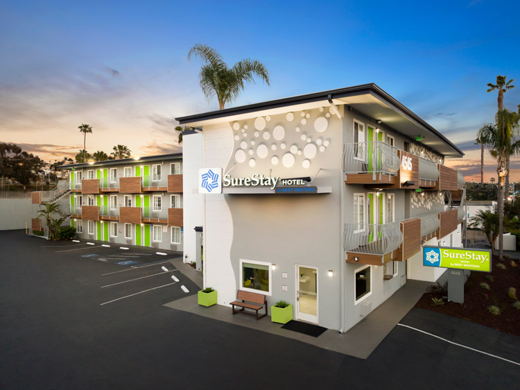 SureStay Hotel exterior at dusk